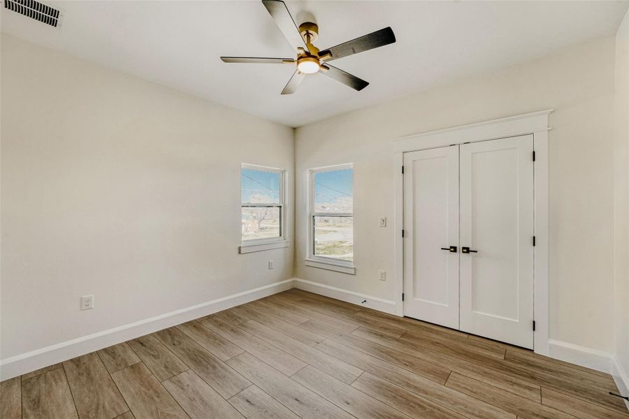 One of three secondary bedrooms upstairs.