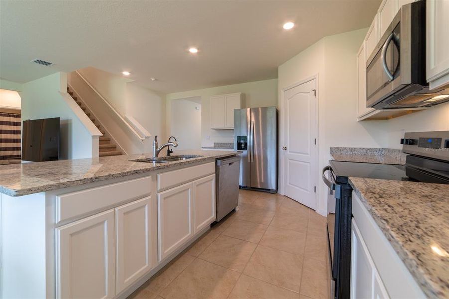 Furnished interior view inside a new home in , Harmony (Image 13).