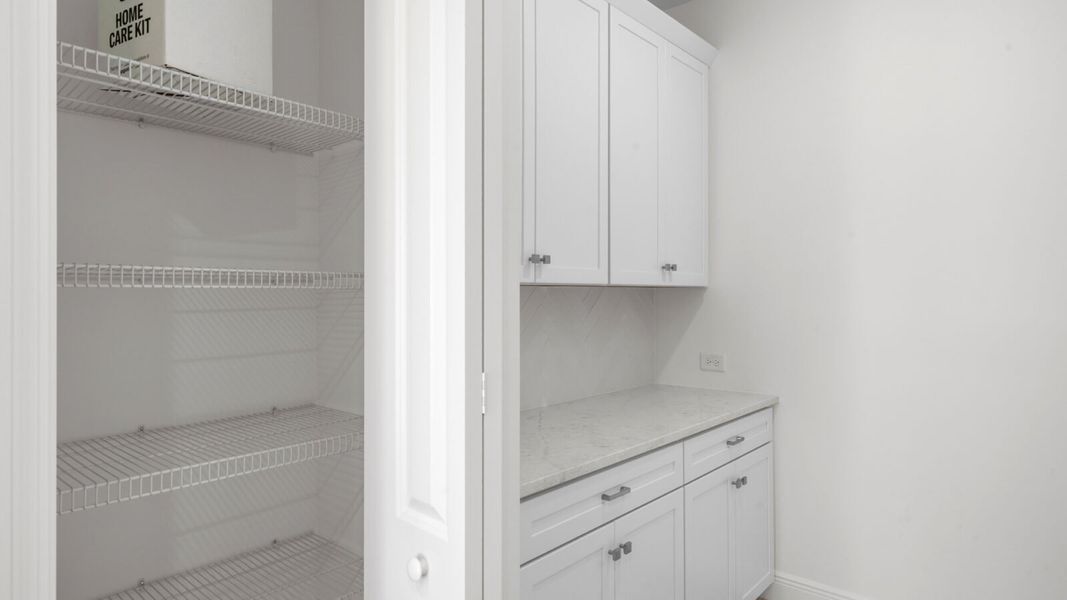 Furnished interior view inside a new home in Verandah, Fort Myers (Image 7).