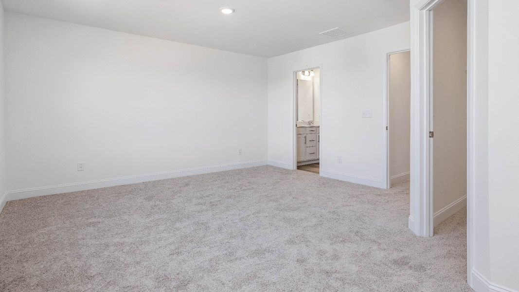 Furnished interior view inside a new home in Sidney Creek Townhomes, Zebulon (Image 16).
