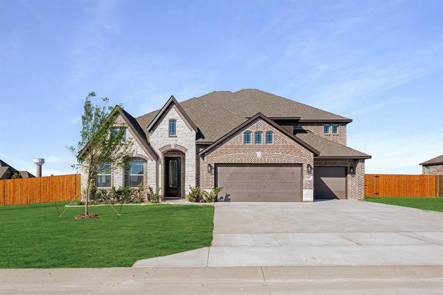 Front exterior of a new home in Coyote Crossing, Godley, TX, highlighting curb appeal (Image 1). Front exterior of a new home in Coyote Crossing, Godley, TX, highlighting curb appeal (Image 1).