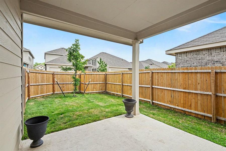 Exterior details and patio area of a home in Northpointe, Fort Worth (Image 3).
