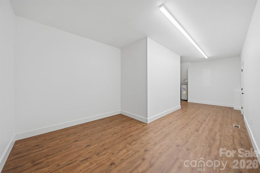Spacious, unfurnished interior of a new home in , Lenoir (Image 17).