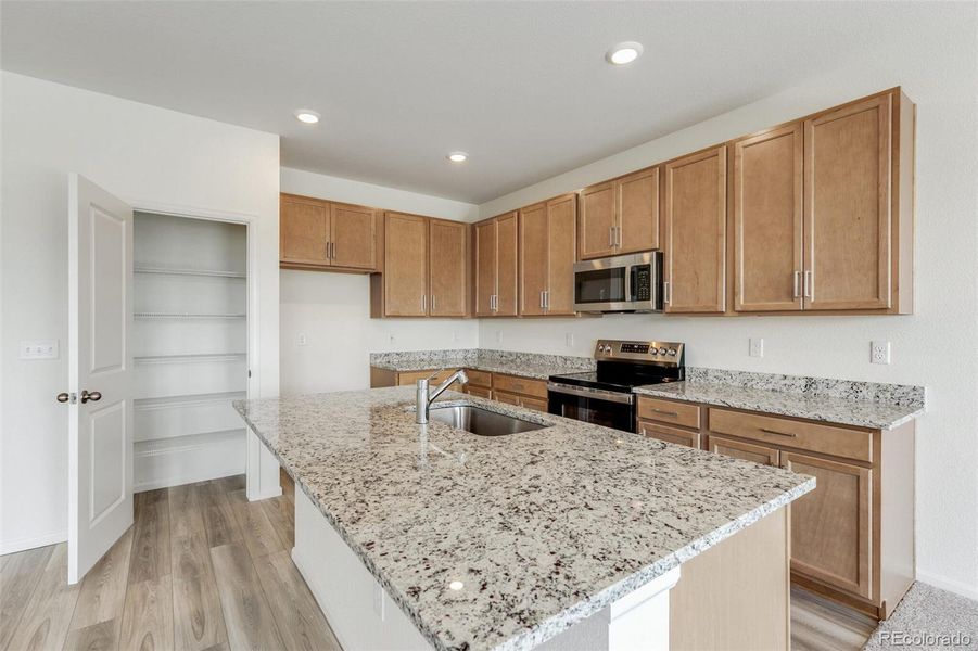 Furnished interior view inside a new home in Terrain Oak Valley, Castle Rock (Image 6).