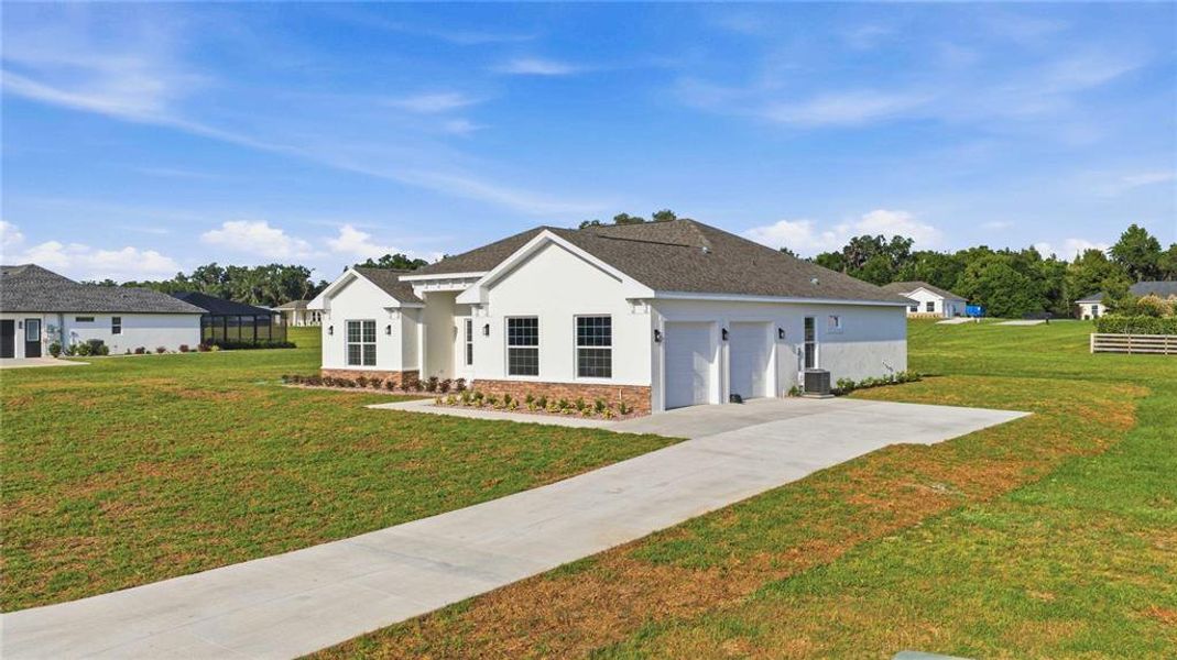 Front exterior of a new home in , Ocala, FL, highlighting curb appeal (Image 20).