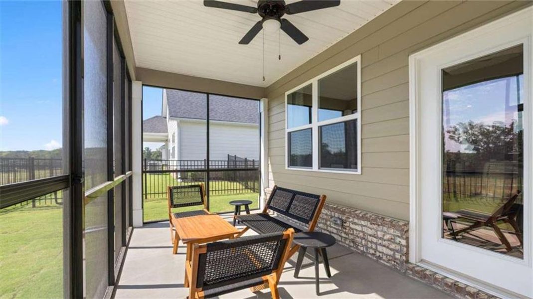 Exterior details and patio area of a home in Oak Ridge Meadows - Active Adult, Locust Grove (Image 3).