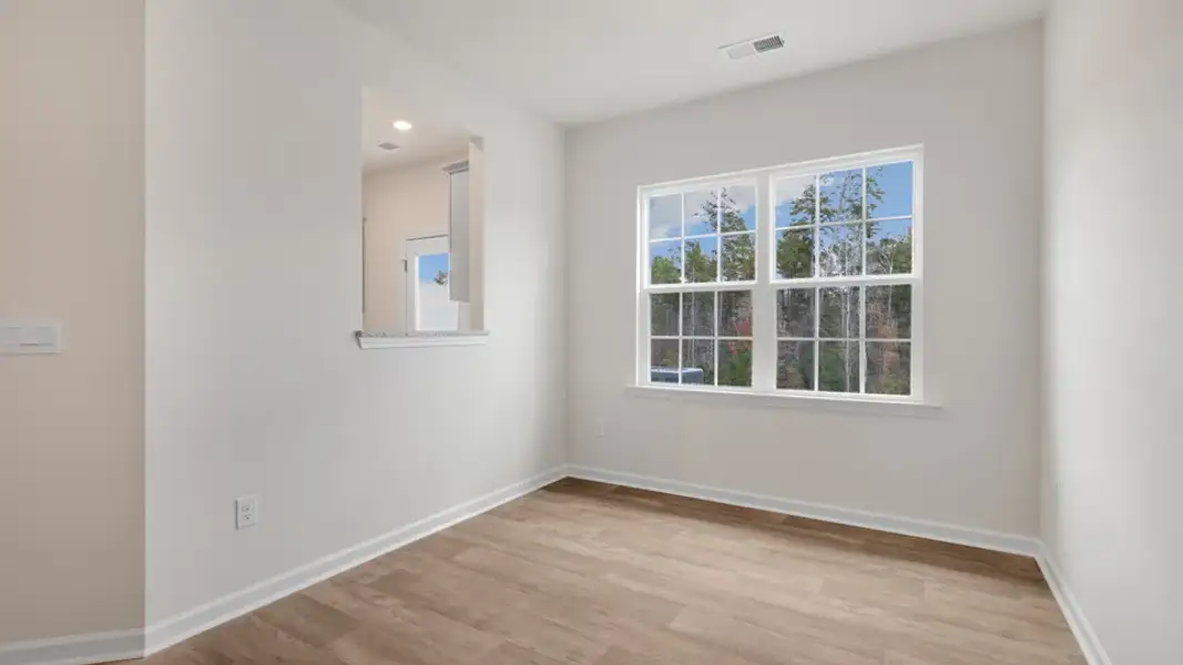 Spacious, unfurnished interior of a new home in The Townes at Galvins Ridge, Sanford (Image 16).