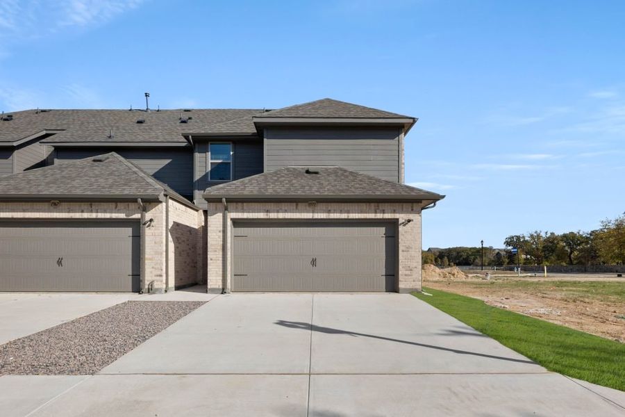 Representative exterior photo of a completed home built from the Lavon by Impression Homes in Timber Ridge, Corinth, TX (Image 22).