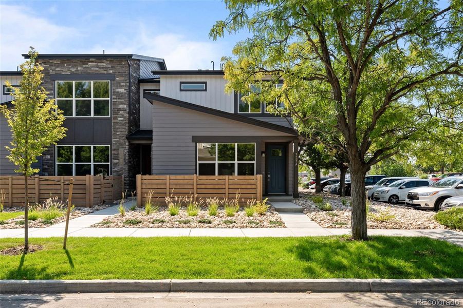 Front exterior of a new home in Ralston Creek, Arvada, CO, highlighting curb appeal (Image 2). Front exterior of a new home in Ralston Creek, Arvada, CO, highlighting curb appeal (Image 2).