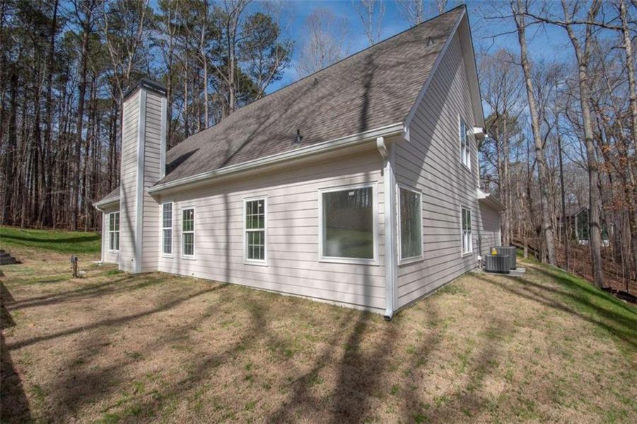 Front exterior of a new home in , Jonesboro, GA, highlighting curb appeal (Image 34).
