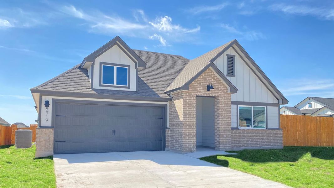 Front exterior of a new home in Mesa Ridge, Temple, TX, highlighting curb appeal (Image 2). Front exterior of a new home in Mesa Ridge, Temple, TX, highlighting curb appeal (Image 2).