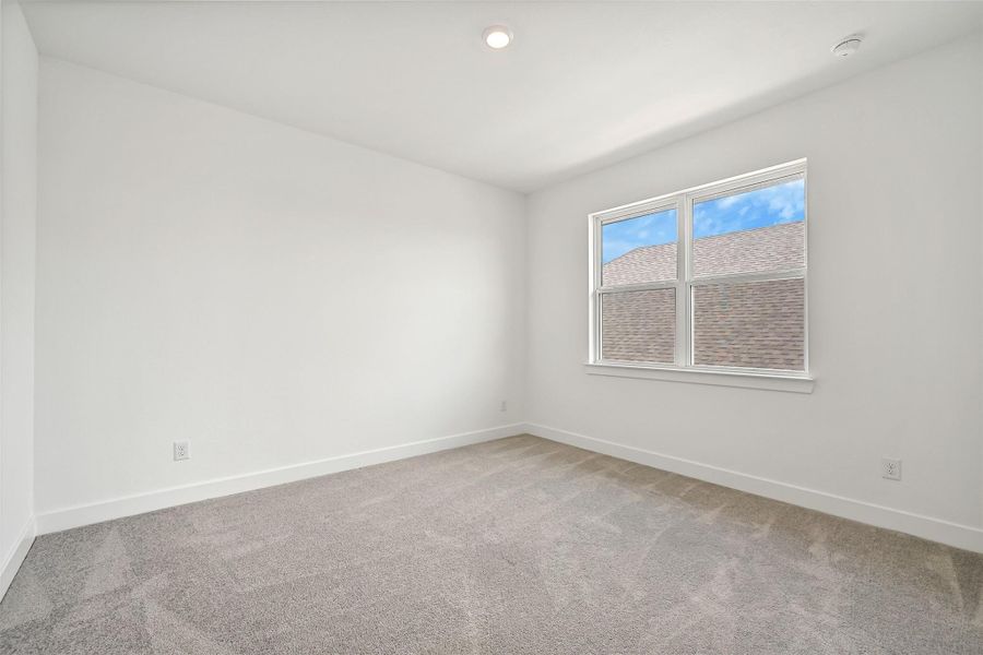 Spacious, unfurnished interior of a new home in Avalon at Friendswood, Friendswood (Image 41).