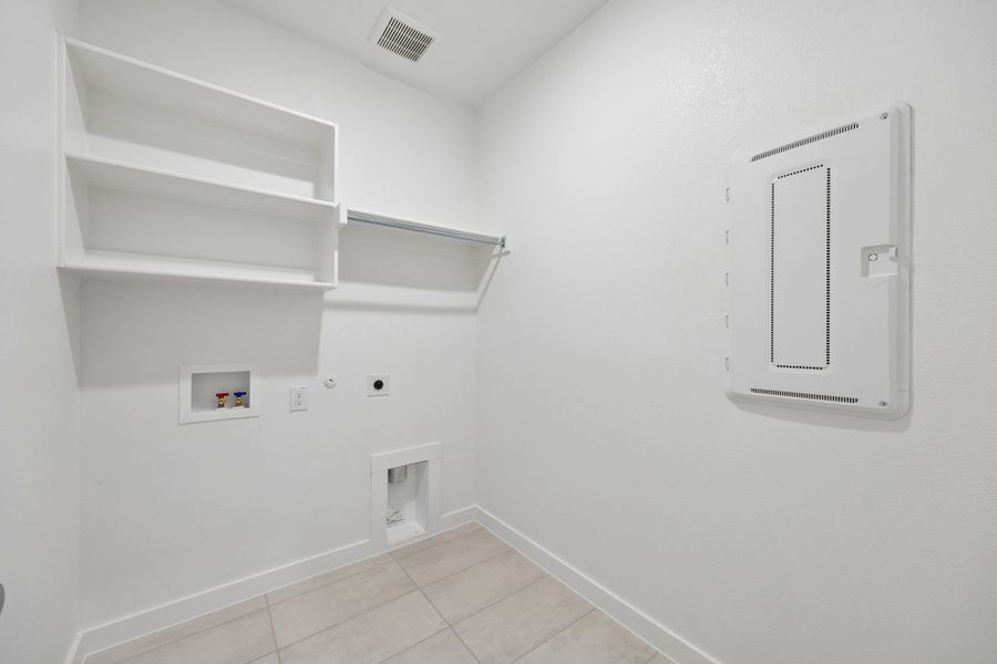 Utility Room in the Winters home plan by Trophy Signature Homes – REPRESENTATIVE PHOTO