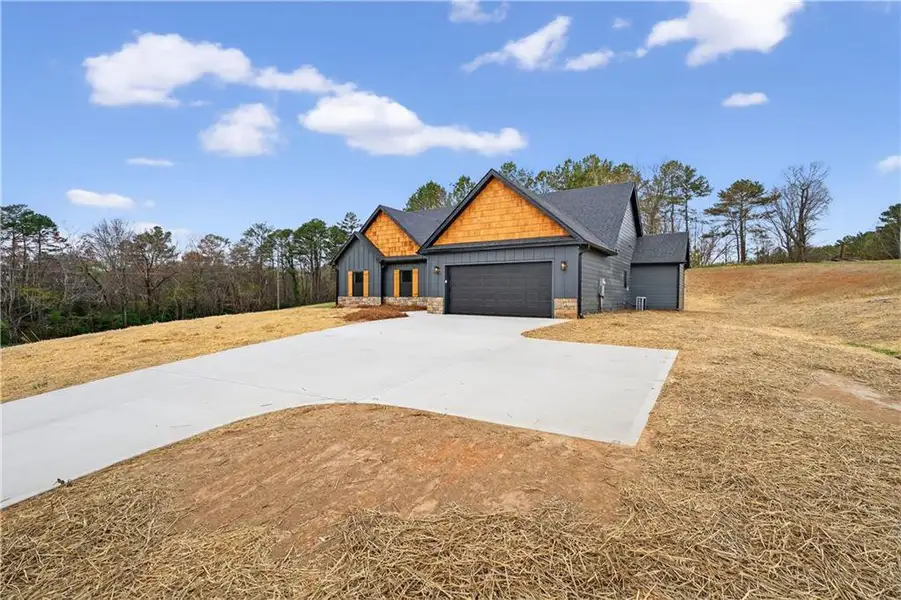 Front exterior of a new home in , Ellijay, GA, highlighting curb appeal (Image 20).