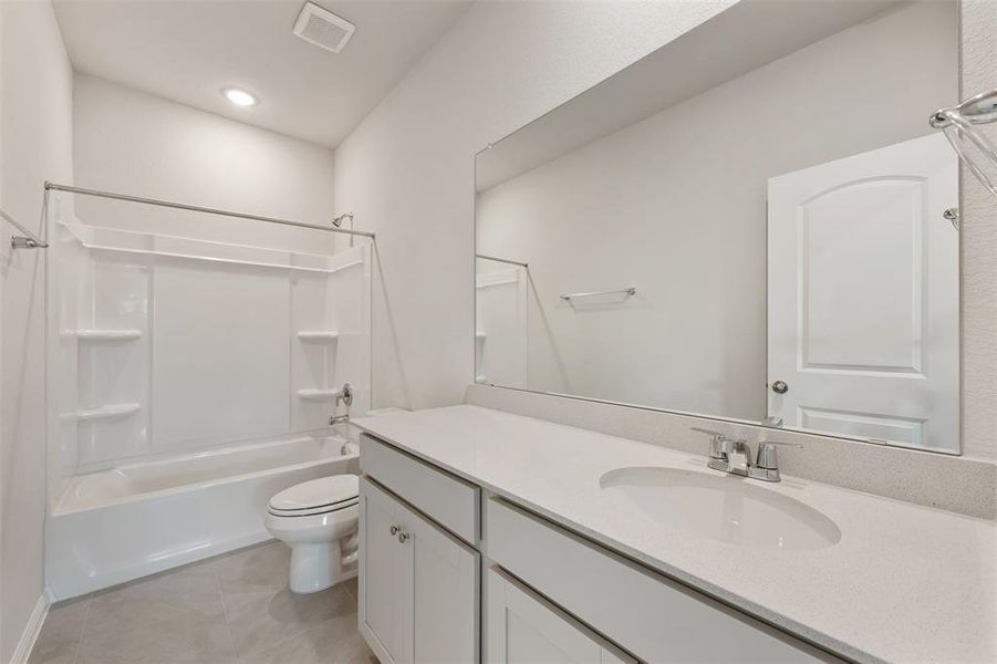Furnished interior view inside a new home in The Colony, Bastrop (Image 14). Furnished interior view inside a new home in The Colony, Bastrop (Image 14).