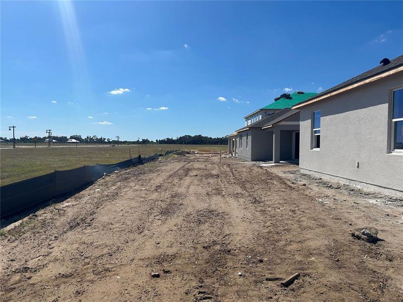 In-progress construction of a new home in Oakfield Trails Traditional, Parrish, FL (Image 32).