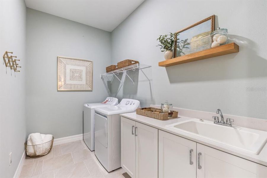 Furnished interior view inside a new home in Kings Gate, Port Charlotte (Image 7).