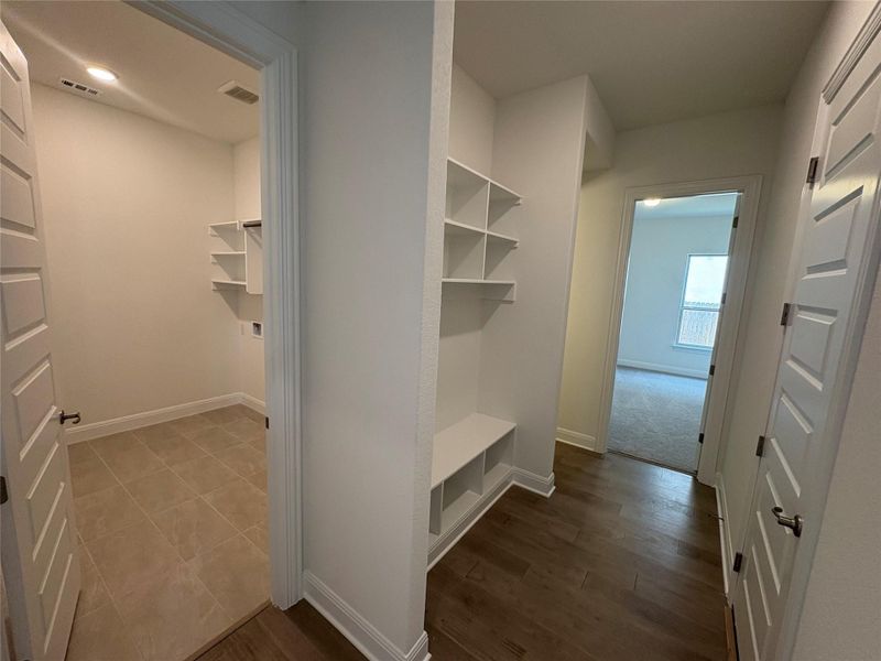 Mudroom featuring baseboards, dark wood finished floors, and recessed lighting Mudroom featuring baseboards, dark wood finished floors, and recessed lighting