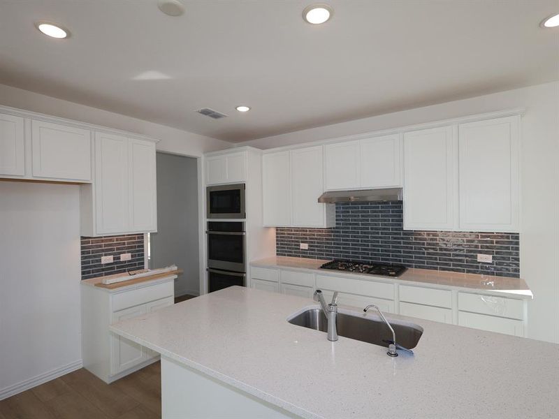 Furnished interior view inside a new home in Vintage Village, Argyle (Image 8).