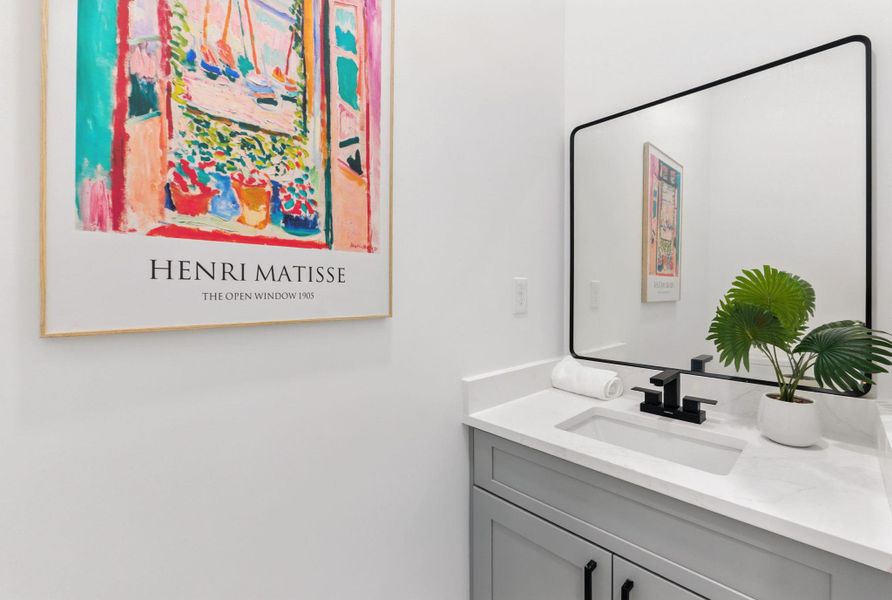 Half bathroom with vanity