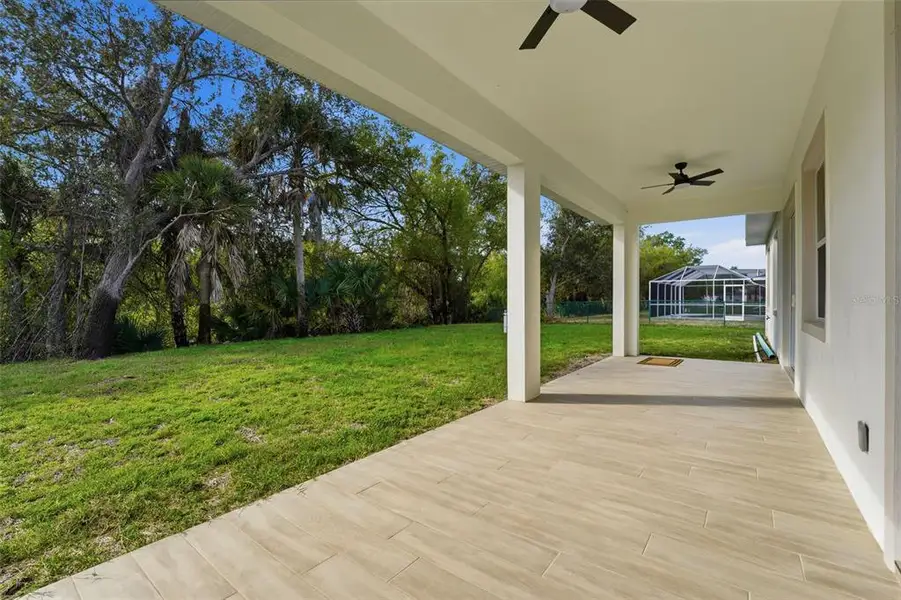 Exterior details and patio area of a home in , North Port (Image 4).