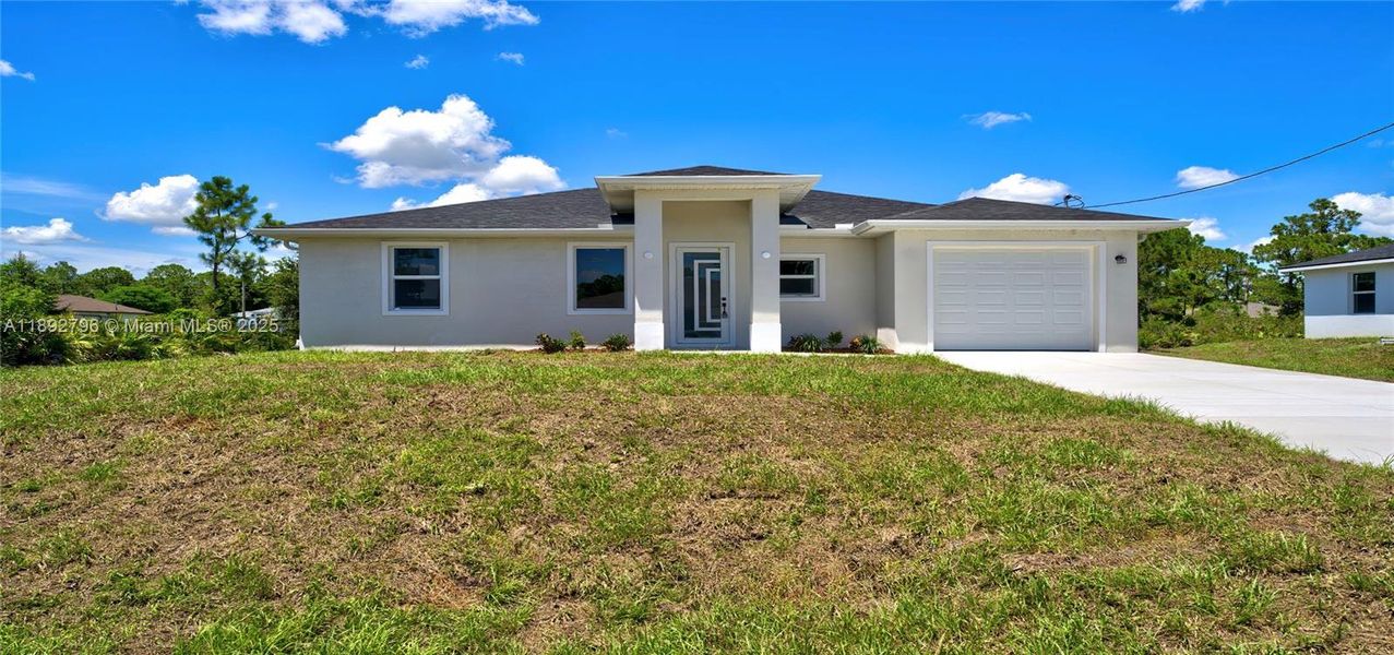 Exterior details and patio area of a home in , Lehigh Acres (Image 14). Exterior details and patio area of a home in , Lehigh Acres (Image 14).