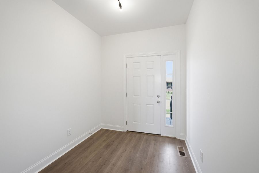 Spacious, unfurnished interior of a new home in McCain's Station, Gallatin (Image 23).