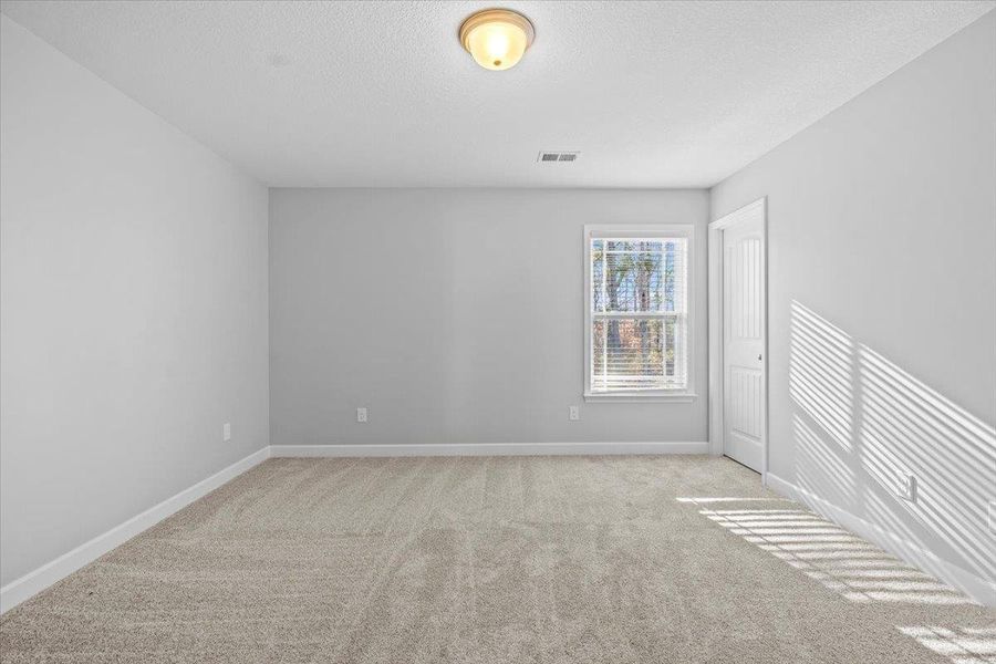 Spacious, unfurnished interior of a new home in Zanes Creek, Inman (Image 27).