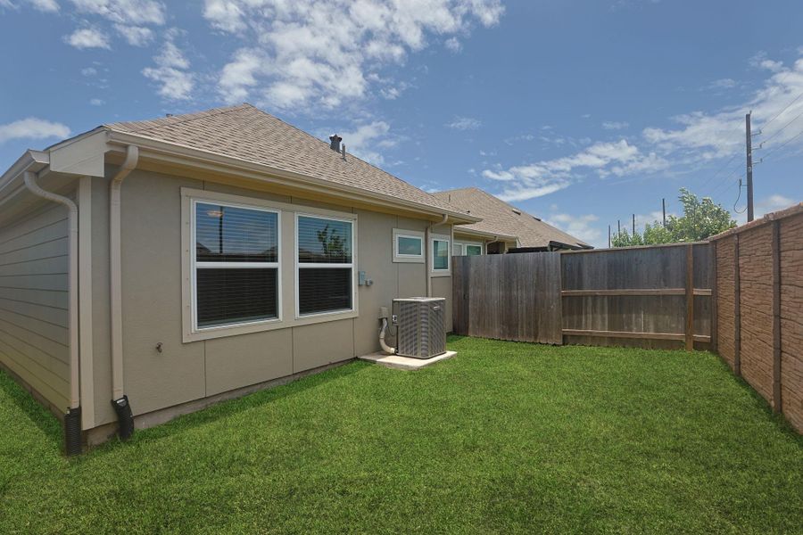 Plenty of yard for playing outside in the back yard.