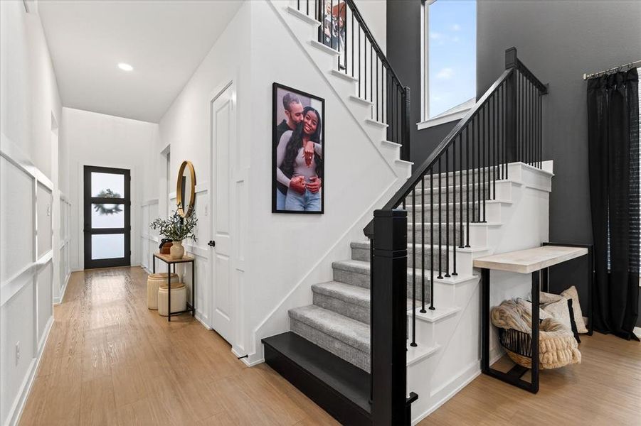 Entryway with stairway and light wood-style floors Entryway with stairway and light wood-style floors