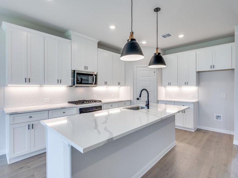 You'll find ample storage and prep space in this thoughtfully designed dream kitchen!