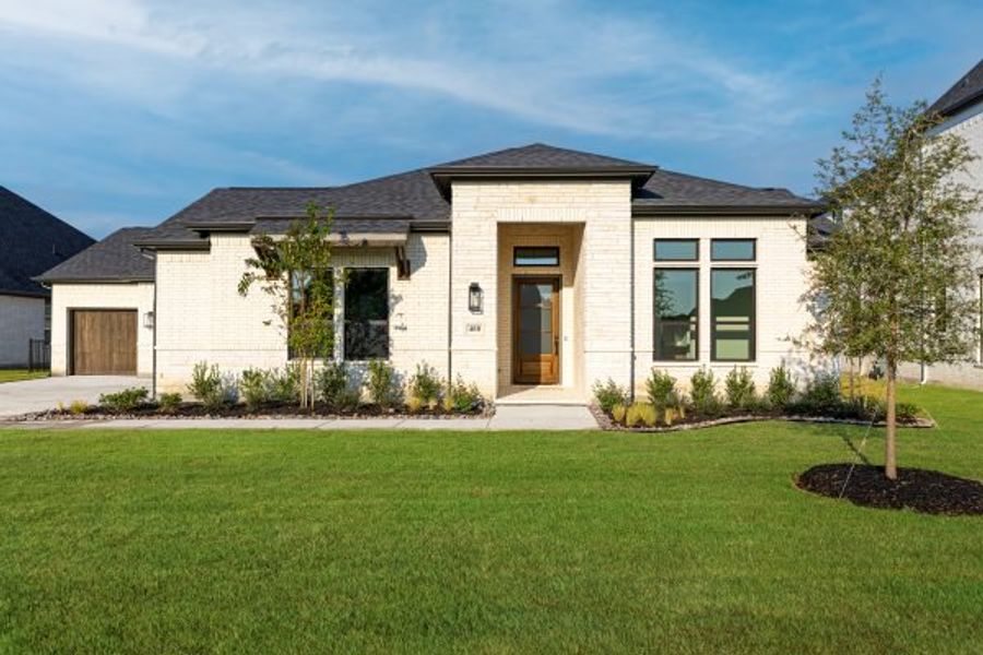 Front exterior of a new home in Heath Golf and Yacht Club, Heath, TX, highlighting curb appeal (Image 27).