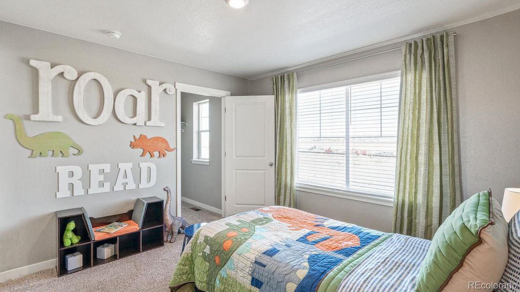 Furnished interior view inside a new home in Trails at Crowfoot, Parker (Image 10).