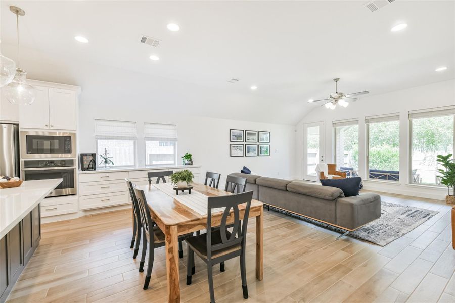 Ample storage space plus room for a large table in this bright dining area. Ample storage space plus room for a large table in this bright dining area.