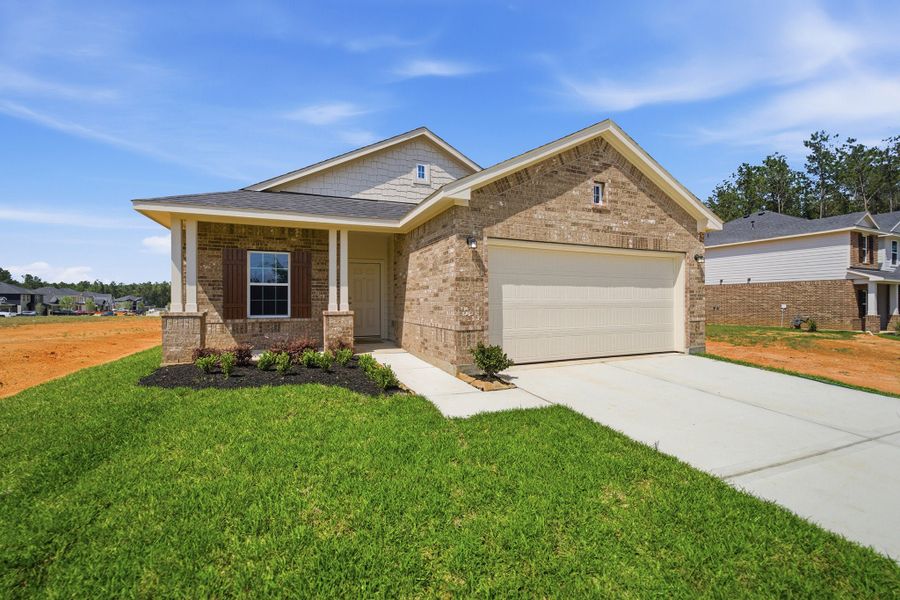 Front exterior of a new home in Magnolia Springs, Montgomery, TX, highlighting curb appeal (Image 26).