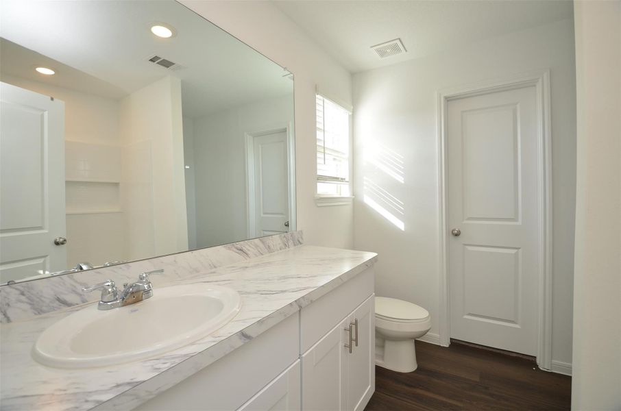 Primary suite bathroom with modern finishes Primary suite bathroom with modern finishes