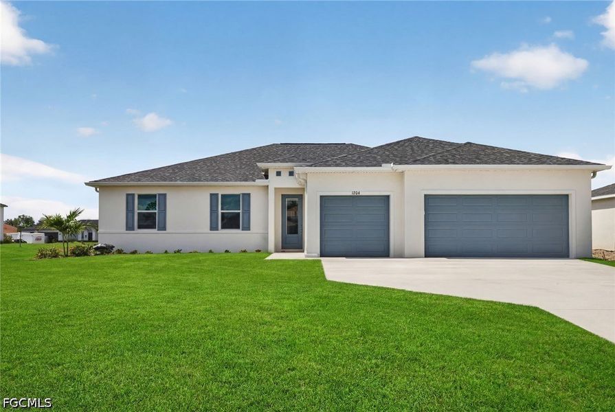 Front exterior of a new home in Cape Coral, Cape Coral, FL, highlighting curb appeal (Image 1). Front exterior of a new home in Cape Coral, Cape Coral, FL, highlighting curb appeal (Image 1).