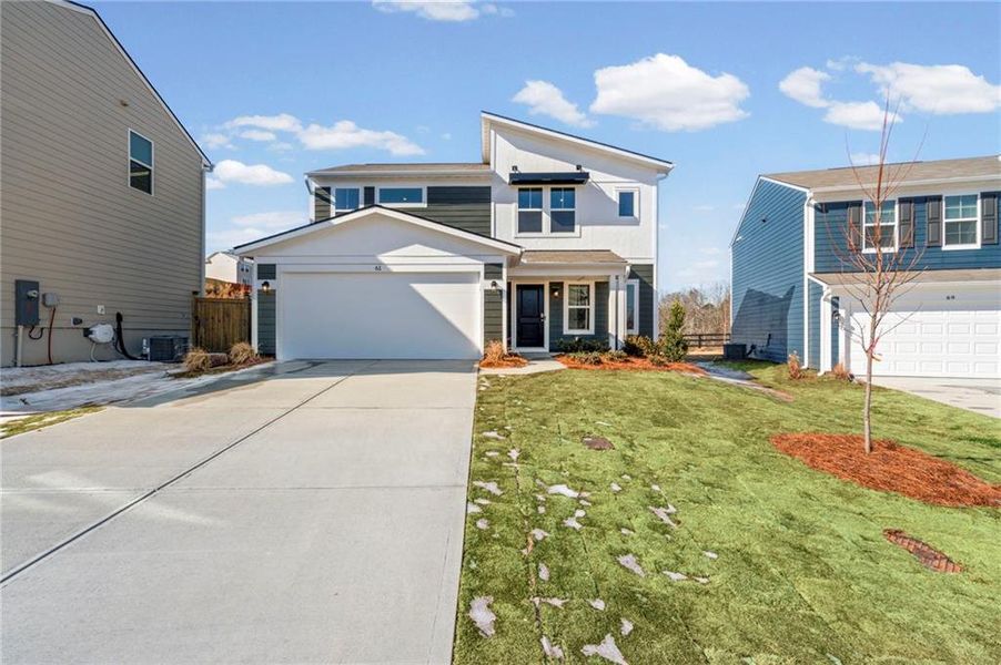 Front exterior of a new home in Crossvine Estates, Braselton, GA, highlighting curb appeal (Image 19).