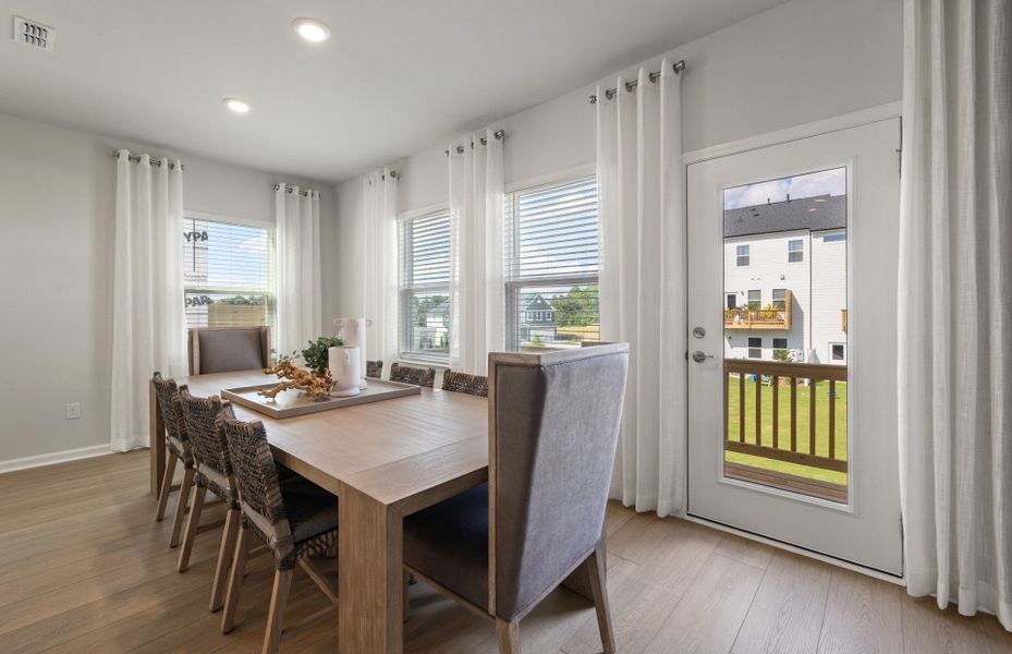 Furnished interior view inside a new home in Lakeside Townes at Riverlights, Wilmington (Image 9).