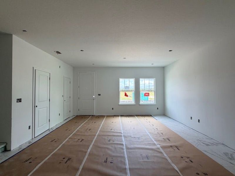 In-progress construction of a new home in Whaley Grove Townhomes, St. Cloud, FL (Image 12).