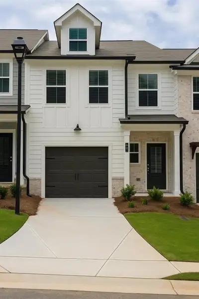 Front exterior of a new home in Medlock Park, Austell, GA, highlighting curb appeal (Image 1).