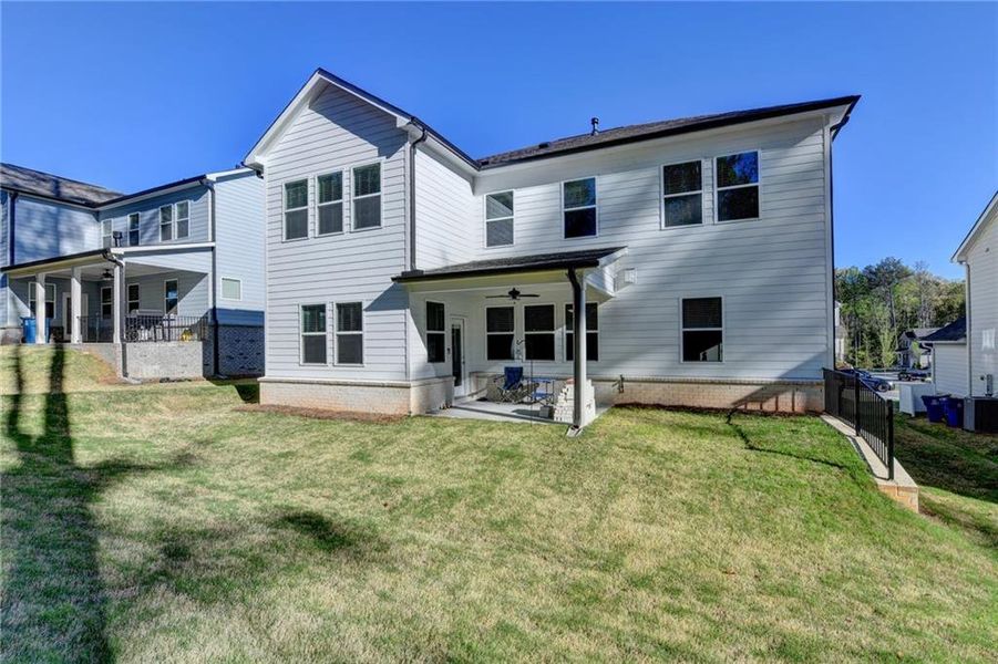 Exterior details and patio area of a home in Bailey Fence, Dacula (Image 30).