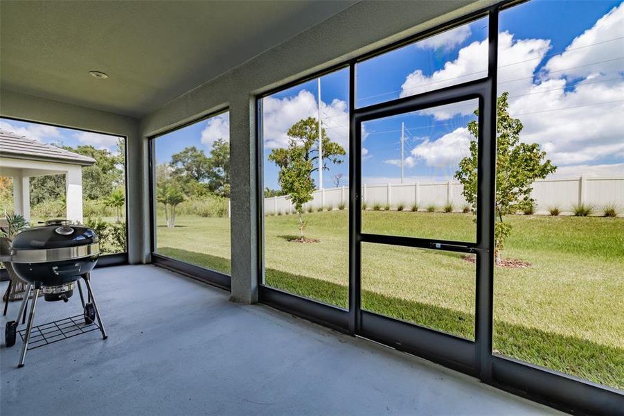 Exterior details and patio area of a home in Prosperity Lakes, Parrish (Image 32).