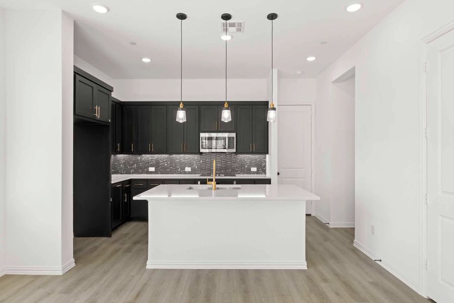 Kitchen featuring the Noir Collection Kitchen featuring the Noir Collection