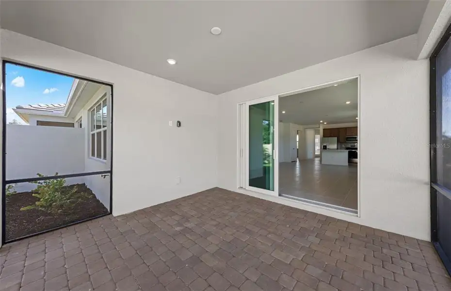 Exterior details and patio area of a home in Legacy Groves, Nokomis (Image 2). Exterior details and patio area of a home in Legacy Groves, Nokomis (Image 2).