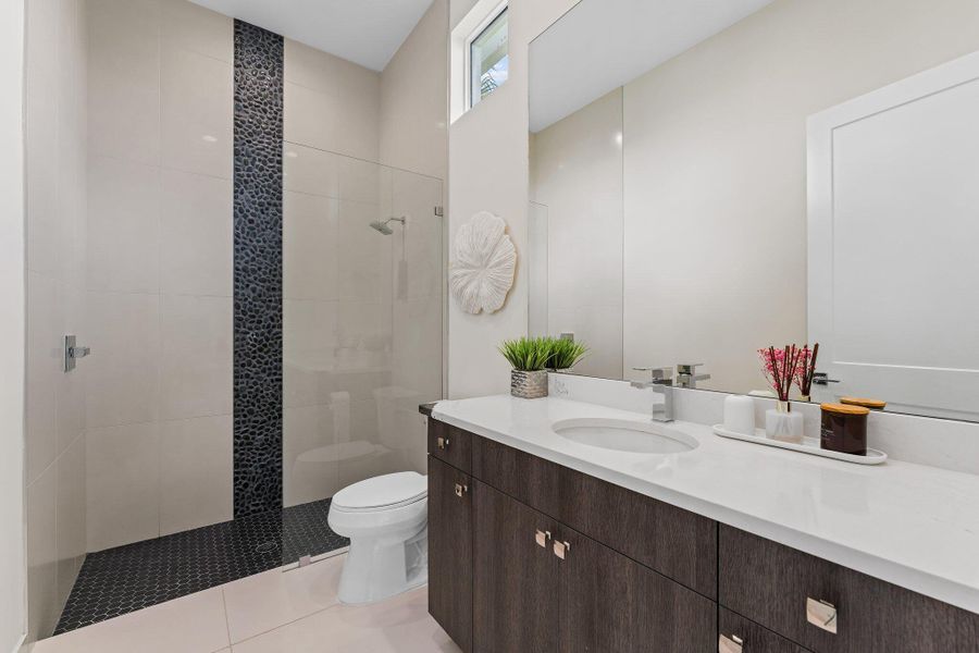 Furnished interior view inside a new home in Coral Isles at Avenir, Palm Beach Gardens (Image 20).