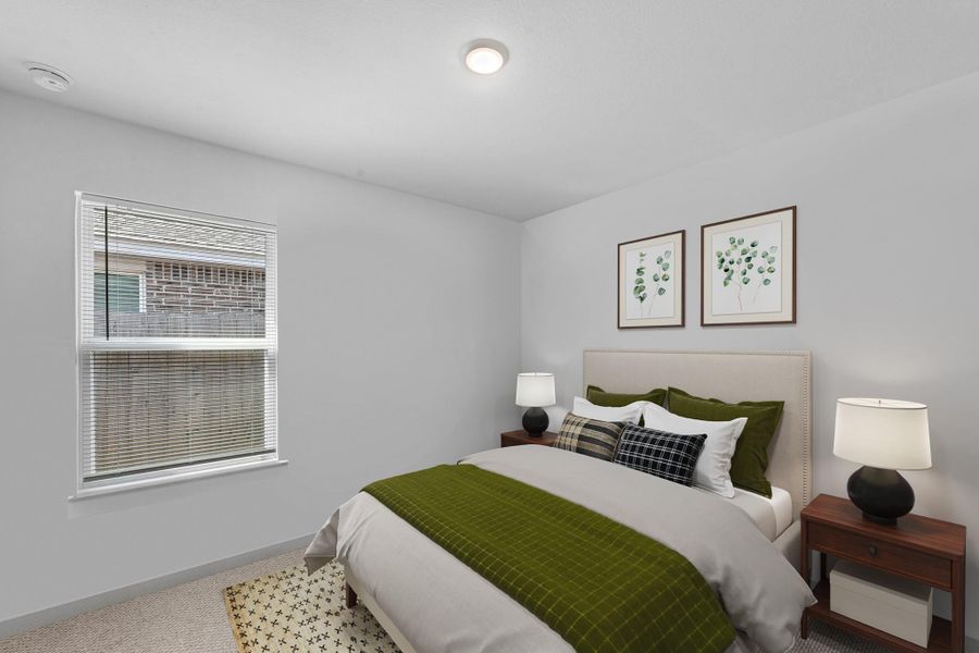 Spacious secondary bedroom with great natural light and a versatile layout. Photo may be virtually staged