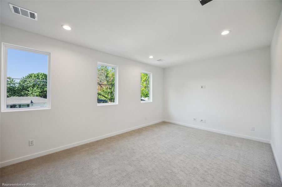 Media room with built in cabinets and beverage color