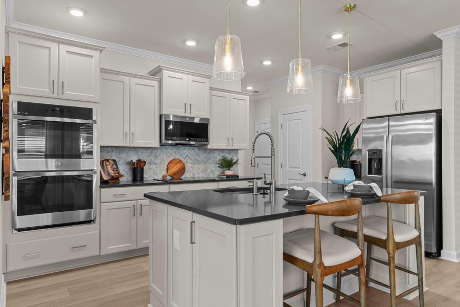 Representative furnished interior of a home built from the The Hibiscus by Chesapeake Homes in Coastal Club of the Carolinas, Calabash (Image 44).