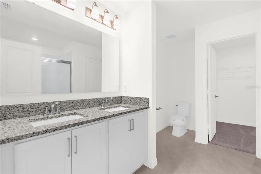 Furnished interior view inside a new home in Bellaviva III at Westside, Davenport (Image 8).